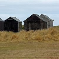 Buy canvas prints of Winterton On Sea Fishermens Sheds by philip milner