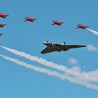Buy canvas prints of Avro Vulcan Bomber & The Red Arrows by Shawn Nicholas