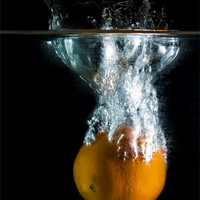Buy canvas prints of Orange Splash by Ian Cocklin