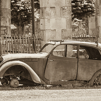 Buy canvas prints of Vintage Car in Oradour sur Glane by Jacqui Farrell