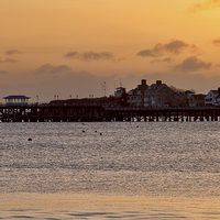 Buy canvas prints of Swanage Pier at Sunrise  by Val Saxby LRPS