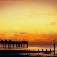 Buy canvas prints of Sunrise over Pier by Jennie Franklin