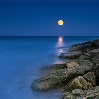 Buy canvas prints of Super Moon on the Rocks by Jennie Franklin