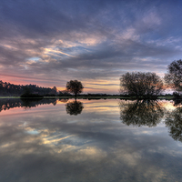 Buy canvas prints of  End of sunrise at the pond by Jennie Franklin