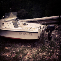 Buy canvas prints of  Abandoned Boats at Lake Guerlédan, Bretagne, Fran by Brian Sharland