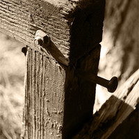 Buy canvas prints of Metal bolts on timber posts by Alfani Photography