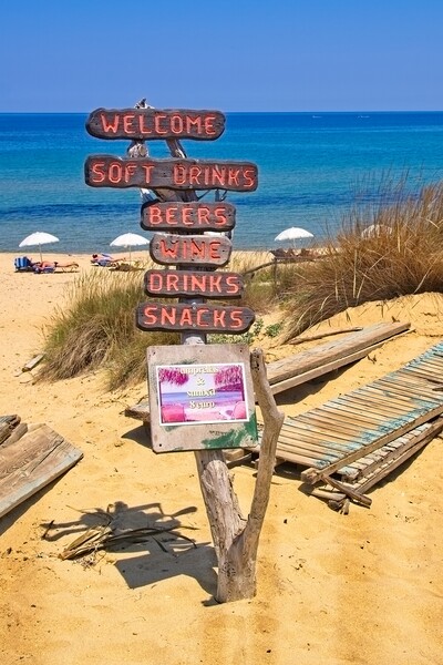 Mandraki beach beach sign Skiathos. Picture Board by Alan Matkin