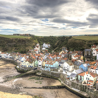Buy canvas prints of Tide out in Staithes Harbour by Alan Matkin