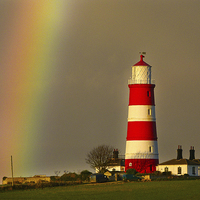 Buy canvas prints of Lighthouse Under the Rainbow by Simon Deacon