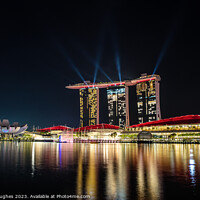 Buy canvas prints of Marian Bay Sands hotel in red lights by Steve Hughes