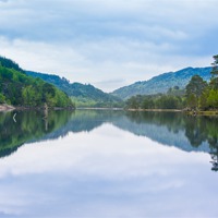 Buy canvas prints of Tranquility of a Scottish Loch by Steve Hughes