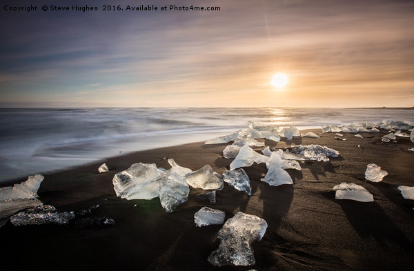 Ice on the Black Sand at Jökulsárlón in Iceland Picture Board by Steve Hughes