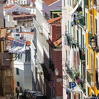 Buy canvas prints of Steep Lisbon cobbled street by Steve Hughes