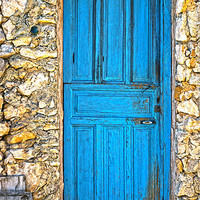 Buy canvas prints of Blue door at Bornos by Digby Merry