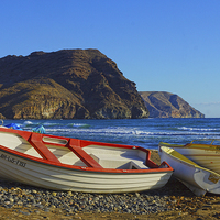 Buy canvas prints of Boats on the beach at Las Negras by Digby Merry