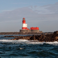 Buy canvas prints of Longstone Lighthouse by Roger Butler