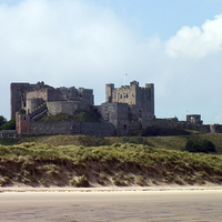 Buy canvas prints of Bamburgh Castle Northumberland by Roger Butler