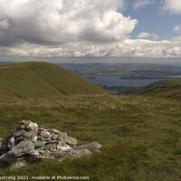 Buy canvas prints of A cairn near the summit of Bienn Dubh, Luss, Scotl by Simon Armstrong