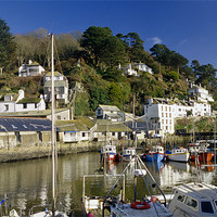 Buy canvas prints of A sunny day in Polperro Harbour, Cornwall by Simon Armstrong