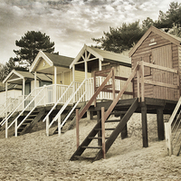 Buy canvas prints of  Vintage Beach Huts.  by Paul Holman Photography
