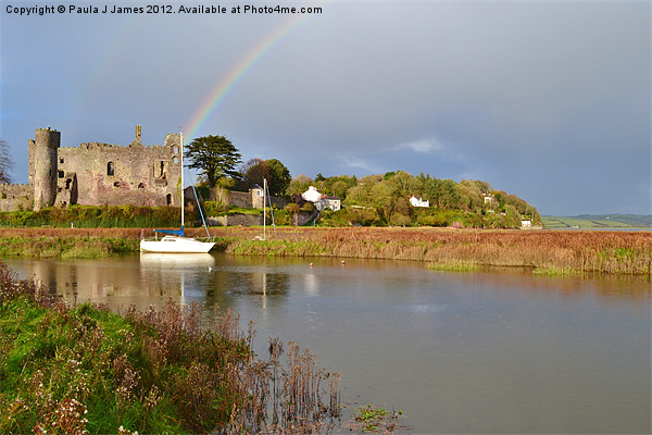 Rainbow over Laugharne Castle Picture Board by Paula J James