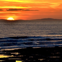 Buy canvas prints of Sunset behind the Gower Peninsula by Paula J James