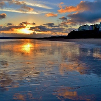 Buy canvas prints of Sunset in Tenby by Paula J James