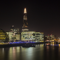 Buy canvas prints of London Skyline and The Shard at night. by Peter Carroll