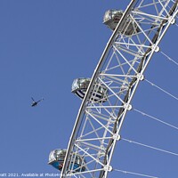 Buy canvas prints of Helicopter And London Eye by David Pyatt
