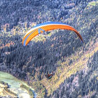 Buy canvas prints of Paragliding French Alps by David Pyatt