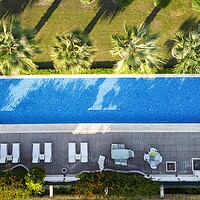 Buy canvas prints of Swimming Pool Aerial View  by David Pyatt