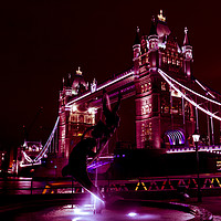 Buy canvas prints of Tower Bridge And The Girl and Dolphin Statue by David Pyatt