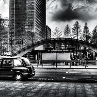 Buy canvas prints of Taxi at Canary Wharf by David Pyatt