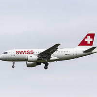 Buy canvas prints of Swiss Airlines Airbus A319 by David Pyatt