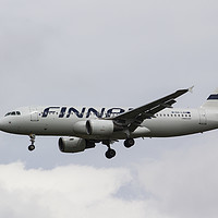 Buy canvas prints of Finnair Airbus A320 by David Pyatt