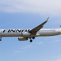 Buy canvas prints of Finnair Airbus A321 by David Pyatt