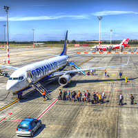 Buy canvas prints of Holidaymakers Boarding Airliner by David Pyatt