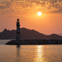 Buy canvas prints of Lighthouse Sunset by David Pyatt
