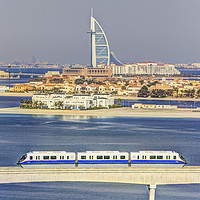 Buy canvas prints of Burj Al Arab and Palm Jumeirah Monorail by David Pyatt