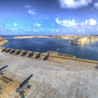 Buy canvas prints of Cannons Valletta Harbour  by David Pyatt