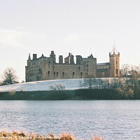 Buy canvas prints of Linlithgow Loch and Palace, Winter by Lee Osborne