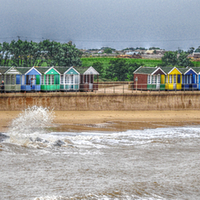 Buy canvas prints of  little beach huts by sue davies