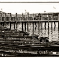 Buy canvas prints of rowing boats on the pier by jane dickie