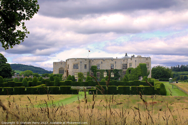 Enigmatic Chirk Castle Under Wrexham Skies Picture Board by Graham Parry