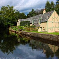 Buy canvas prints of Charming Canal-side Penddol Cottage by Graham Parry