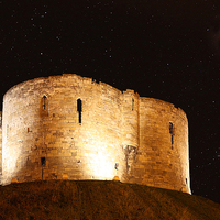 Buy canvas prints of Moonlit Cliffords Tower at Midnight by Graham Parry