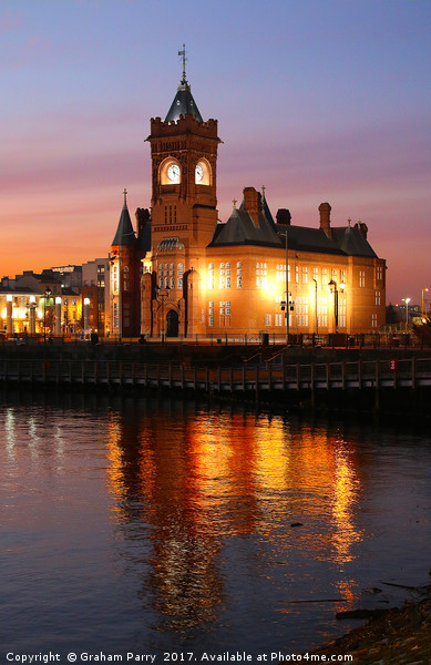 Cardiff Bay's Pierhead: A Dusk Enchantment Picture Board by Graham Parry