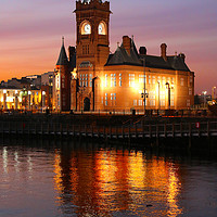 Buy canvas prints of Cardiff Bay's Pierhead: A Dusk Enchantment by Graham Parry