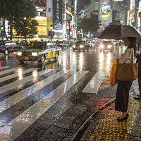 Buy canvas prints of Rain In Tokyo by Clive Eariss