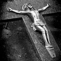 Buy canvas prints of  Effigy Of Christ On A Grave by Adrian Wilkins